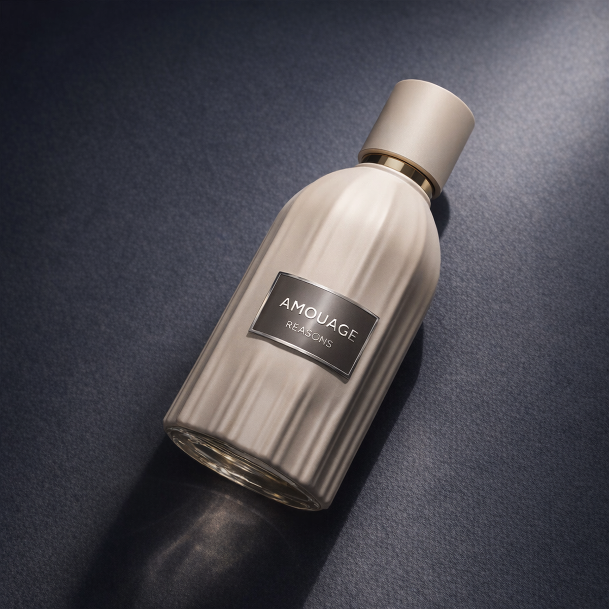 Amouage Reasons Essence Parfum angled still-life gallery showcase