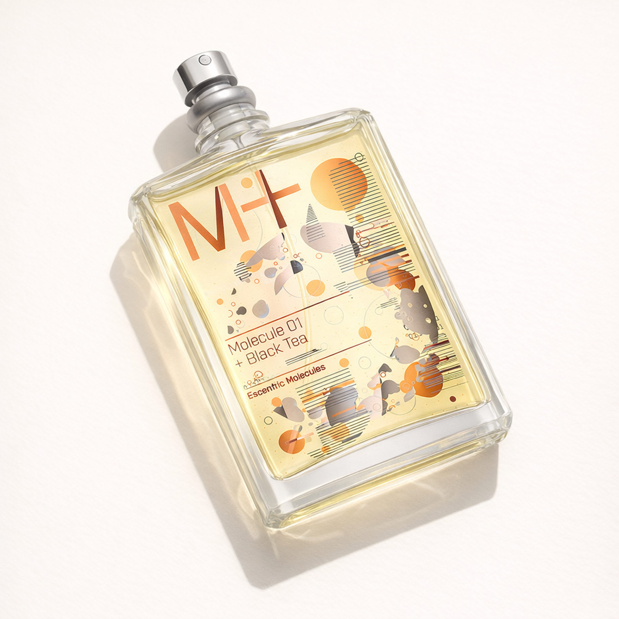 Escentric Molecules M+ Molecule 01 + Black Tea EDT angled still-life gallery showcase