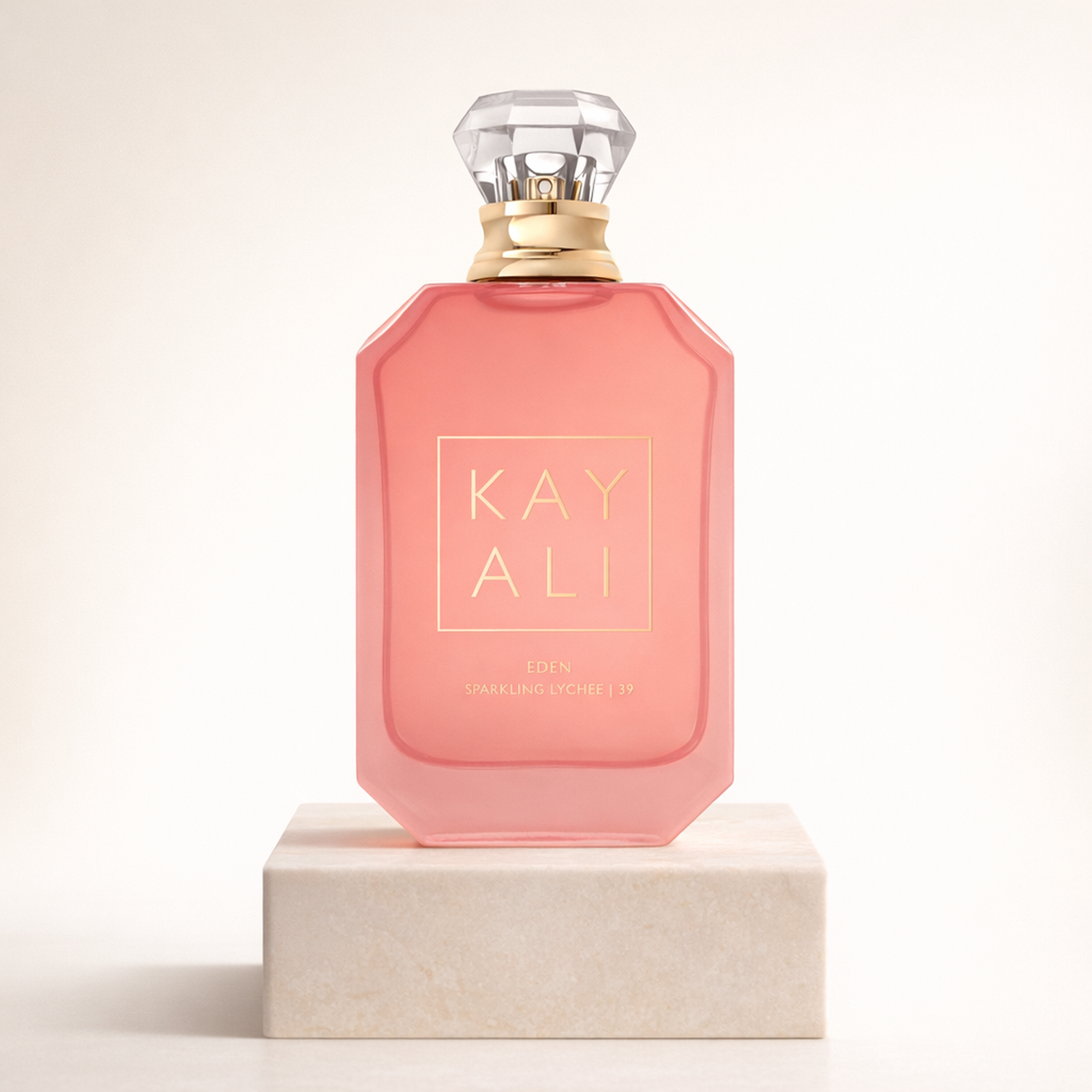 Kayali Eden Sparkling Lychee 39 EDP for Women upright pedestal gallery showcase